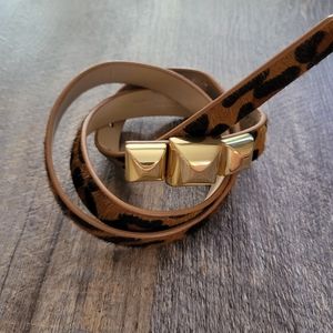 C. Wonder leather cheetah print belt.